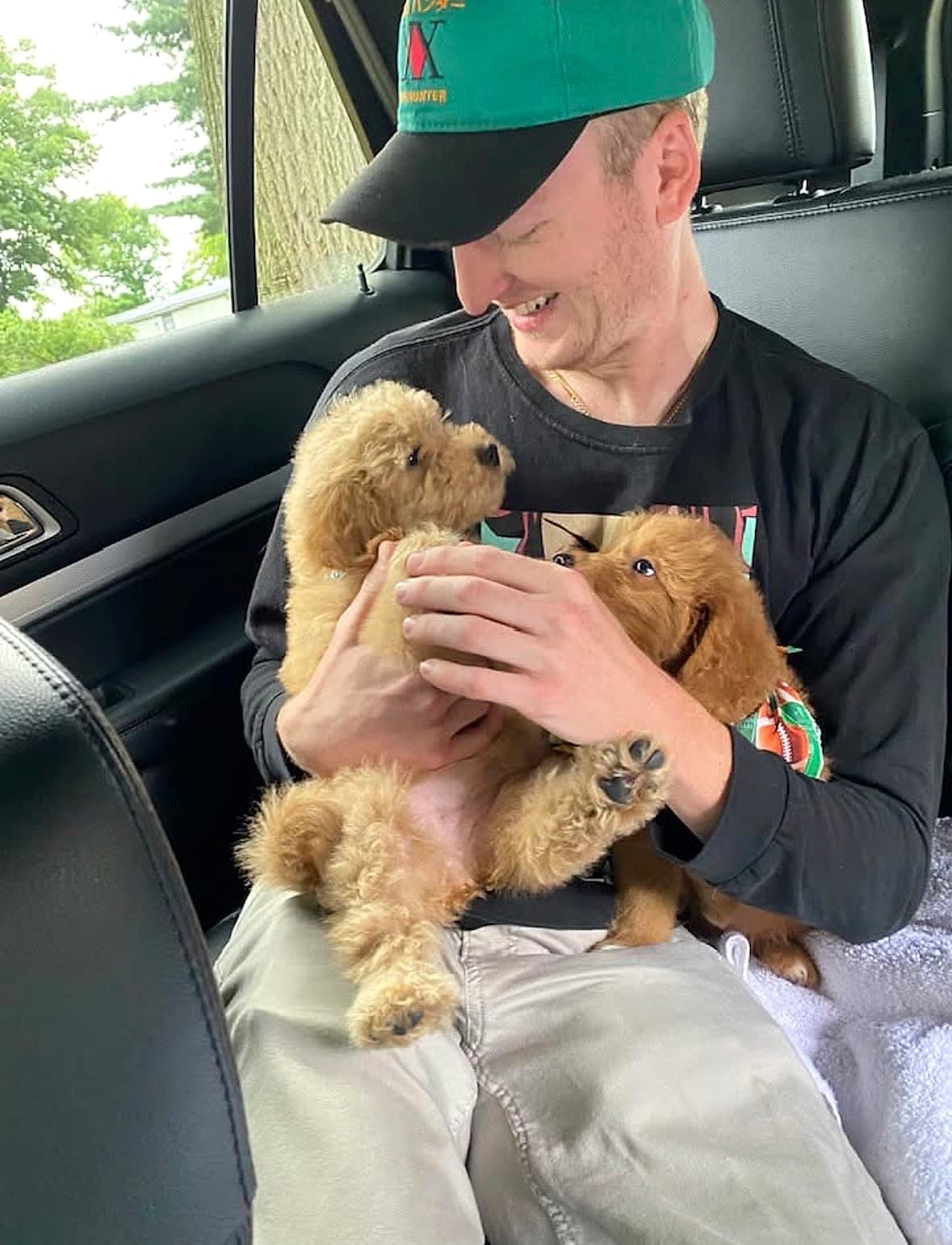 Conner Mamula with his dogs, Kali and Kiki