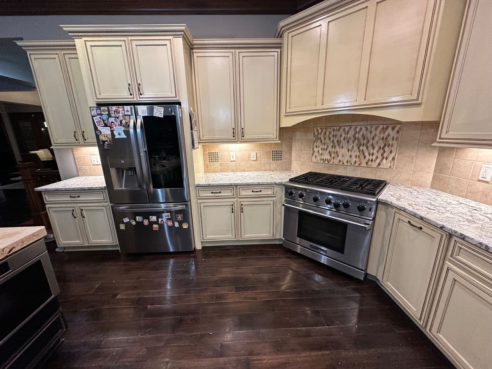 before photo of the Kitchen range hood and backsplash remodel