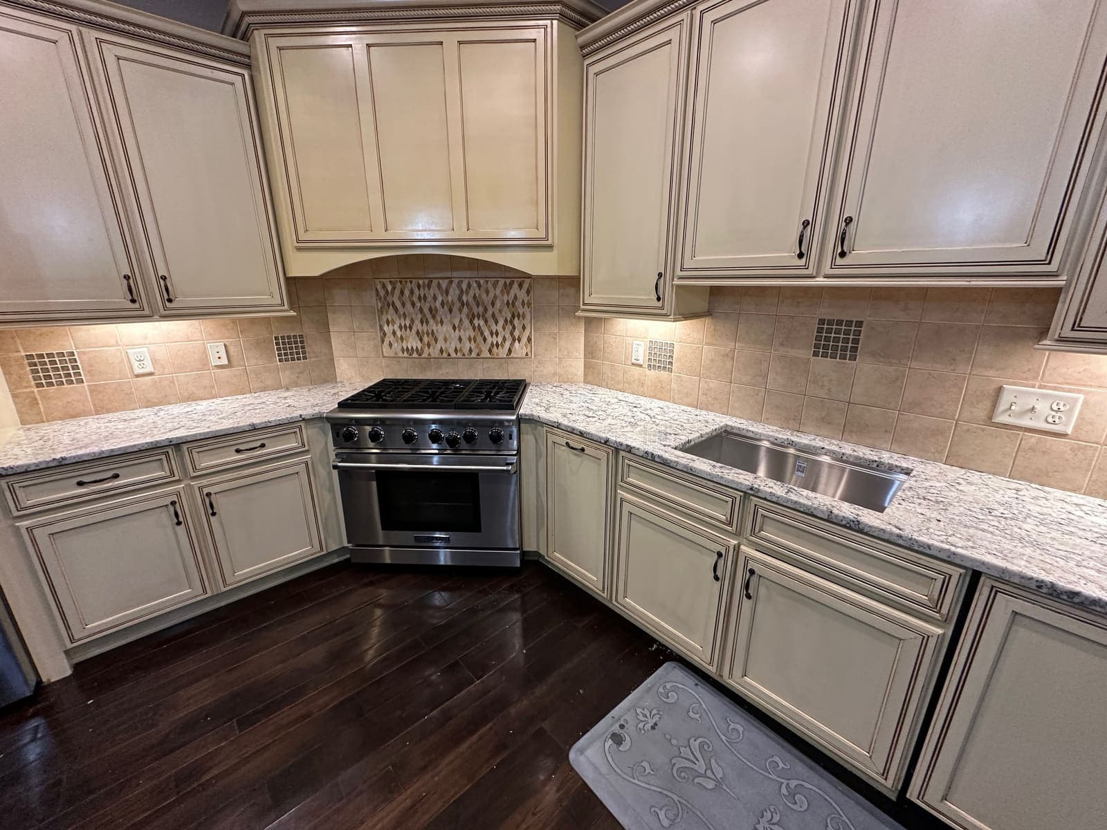 before photo of the Kitchen range hood and backsplash remodel