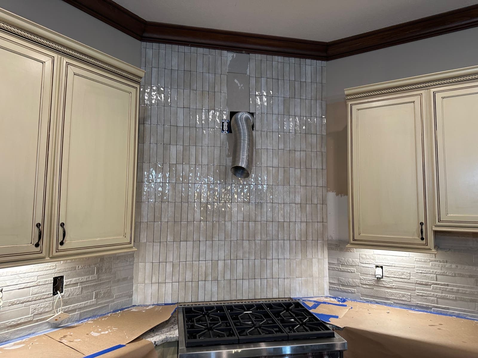 during photo of the Kitchen range hood and backsplash remodel
